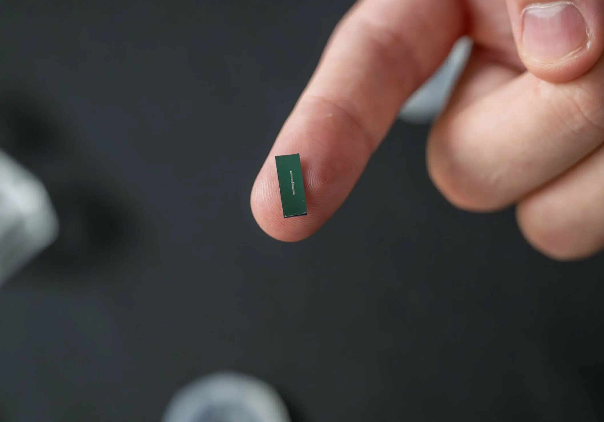 A MEMS magnetostrictive sensor chip on a fingertip