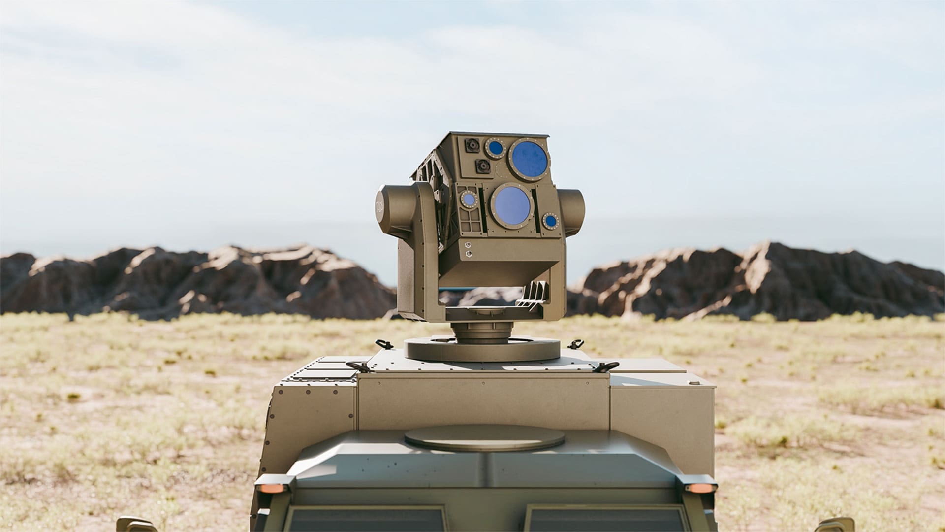 AeroVironment LOCUST X3 laser weapon system on a vehicle in the desert