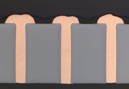 Cross-section of copper-filled through-silicon vias