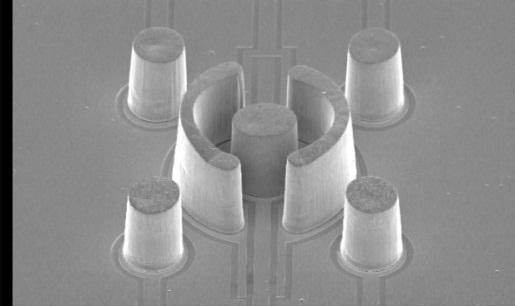 SEM of an electroformed gold ion trap with 150 µm tall posts