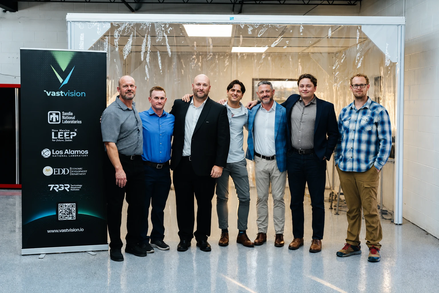 The VastVision team in front of the cleanroom at the Albuquerque lab